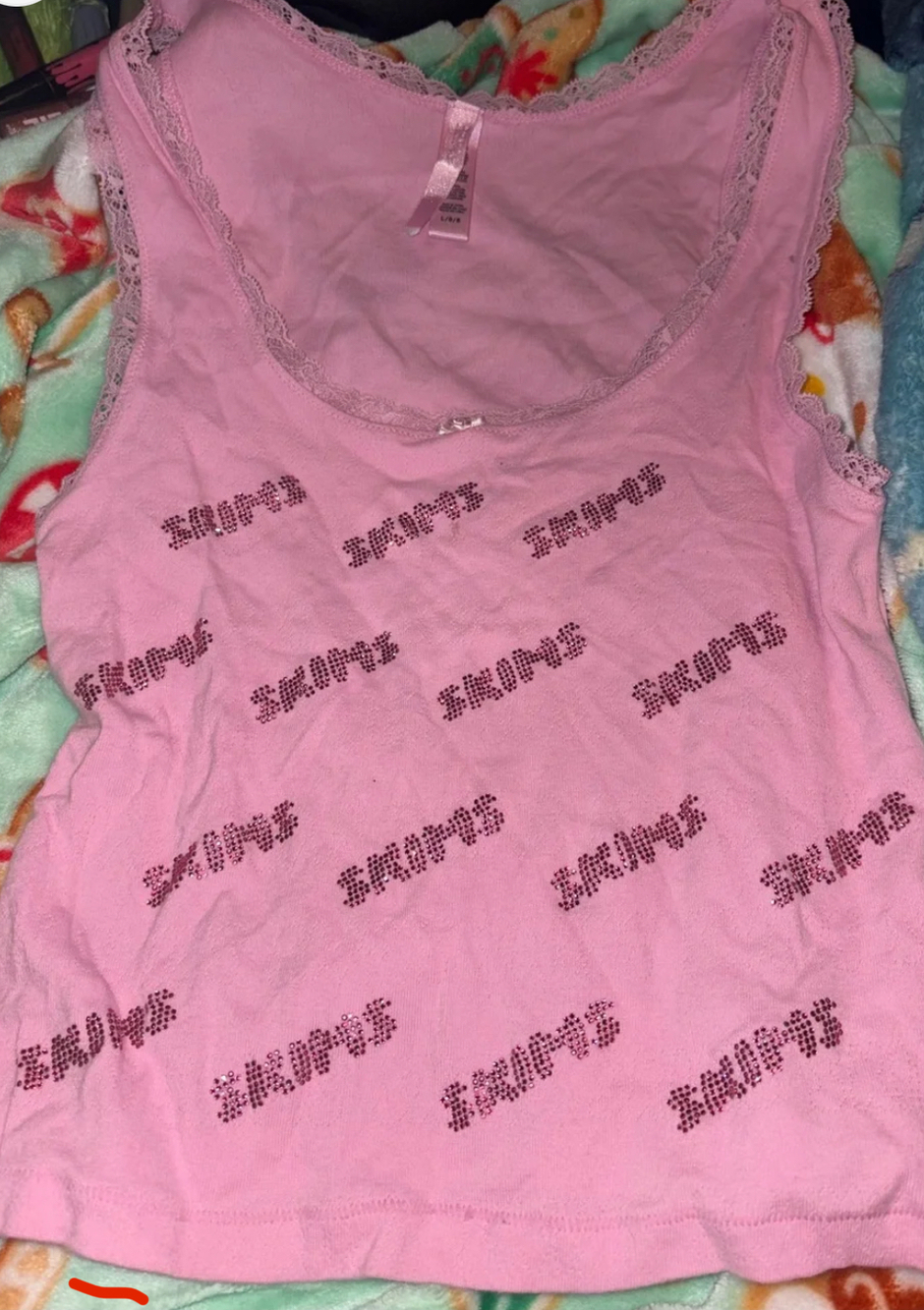 Pink Skims tank top with hot pink rhinestone ‘Skims’ on front and back